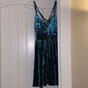 Dark emerald velvet dress.